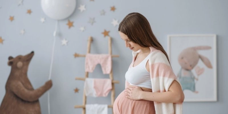 Mơ thấy có bầu sinh con trai