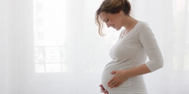 Mơ thấy mình có bầu với người lạ
