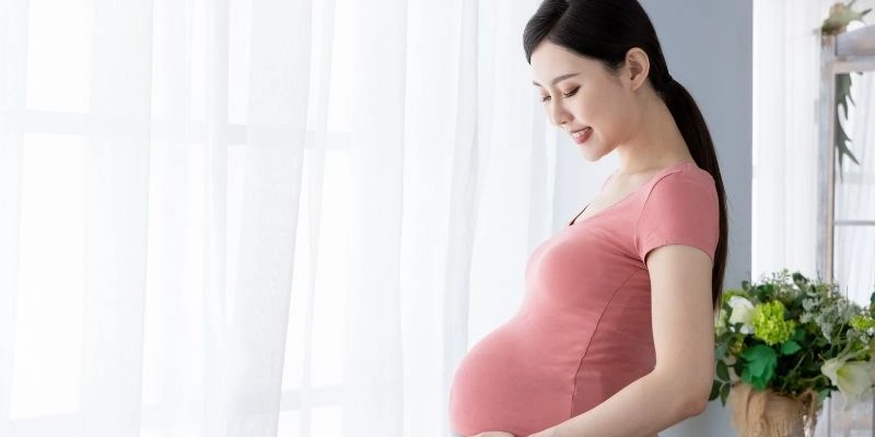 Mơ thấy mình có bầu với người lạ